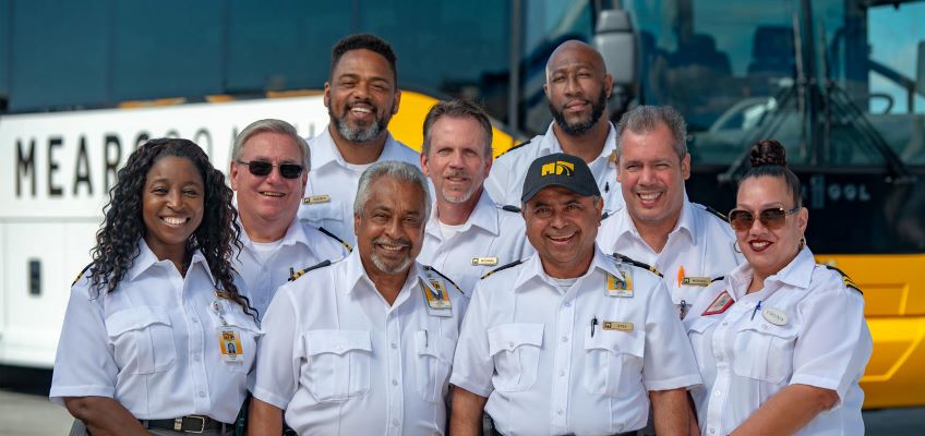 Smiling Mears Bus Drivers